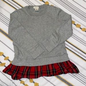 Mixed media peplum sweater